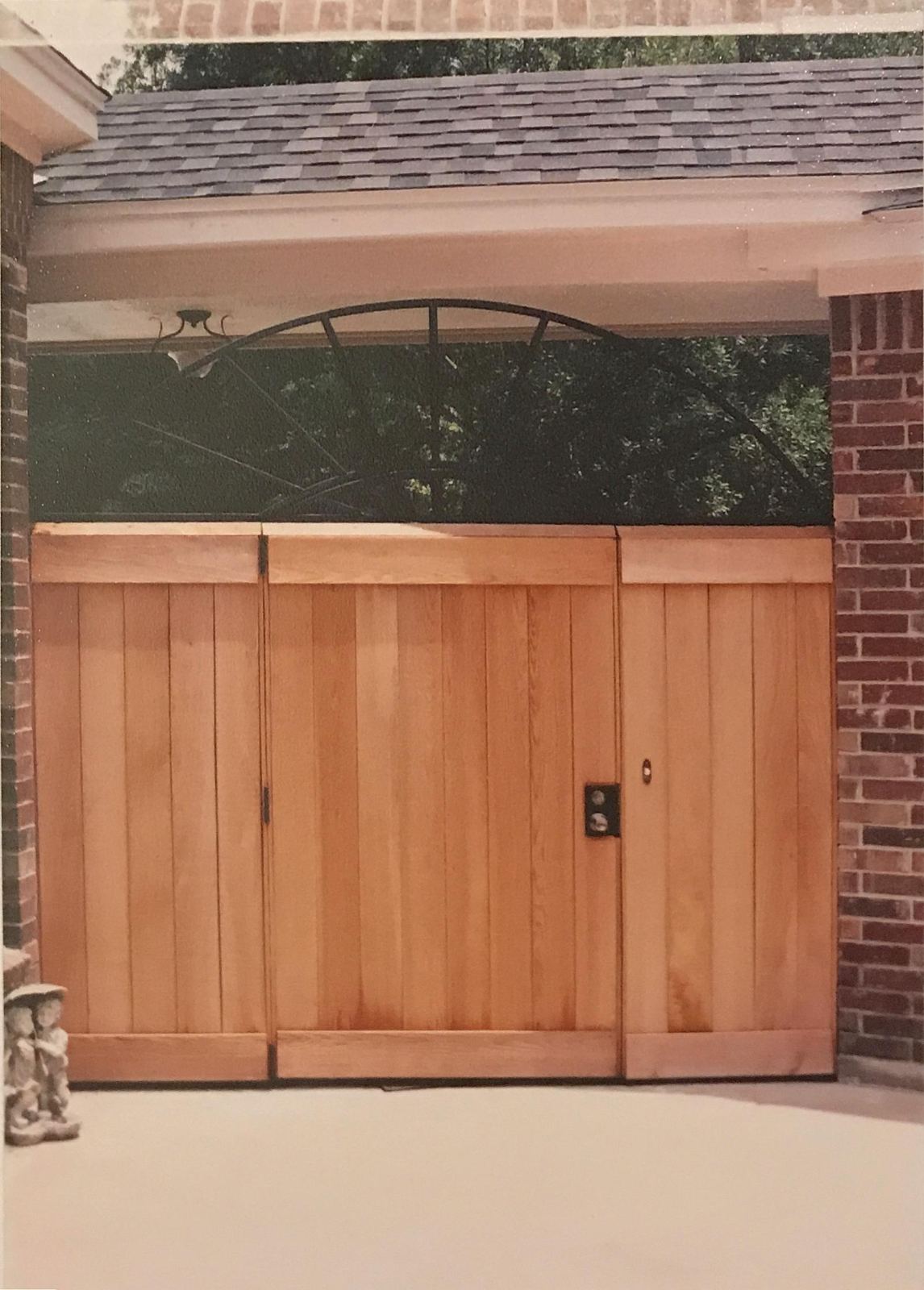 Custom cedar courtyard gates with lock box and doorbell