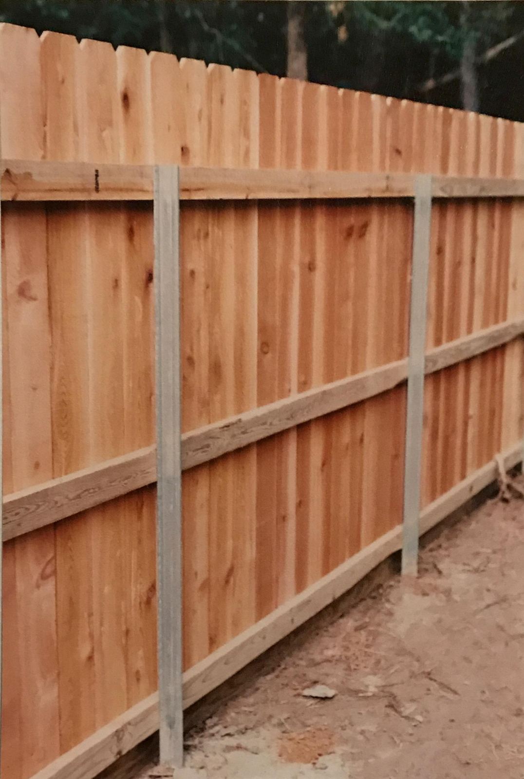 Cedar fence back side with galvanized steel posts