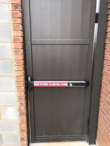 Steel security door with panic exit hardware at Chesterfield Judicial System