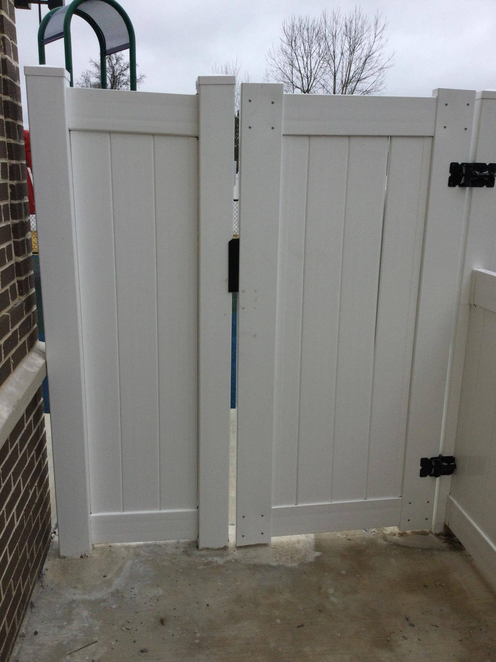 Daycare PVC Fence on Planter Wall