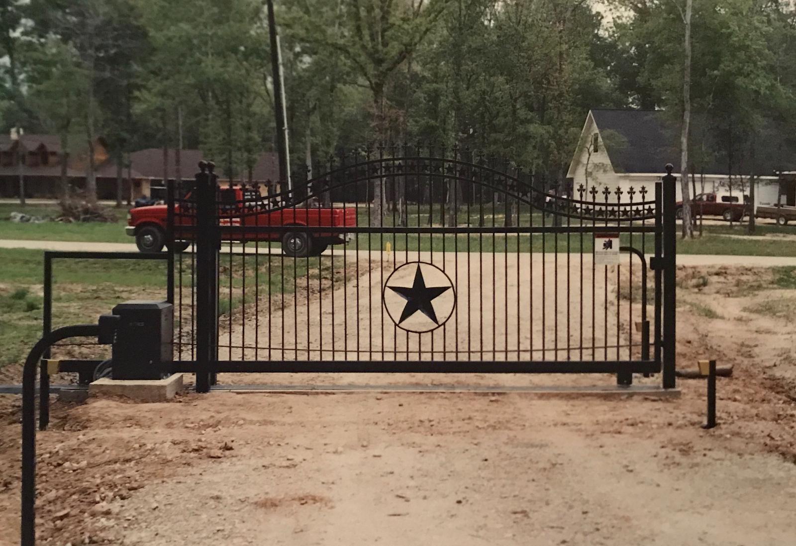 Custom ornamental iron entrance gate, operated
