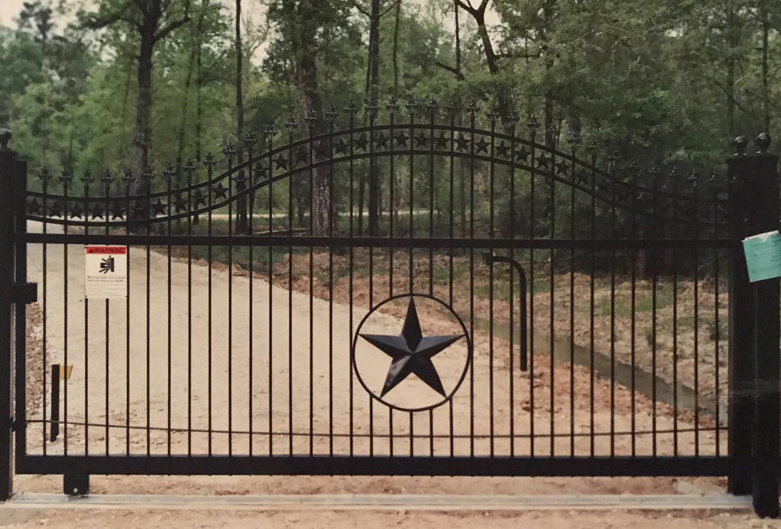 Custom ornamental iron entrance gate, operated