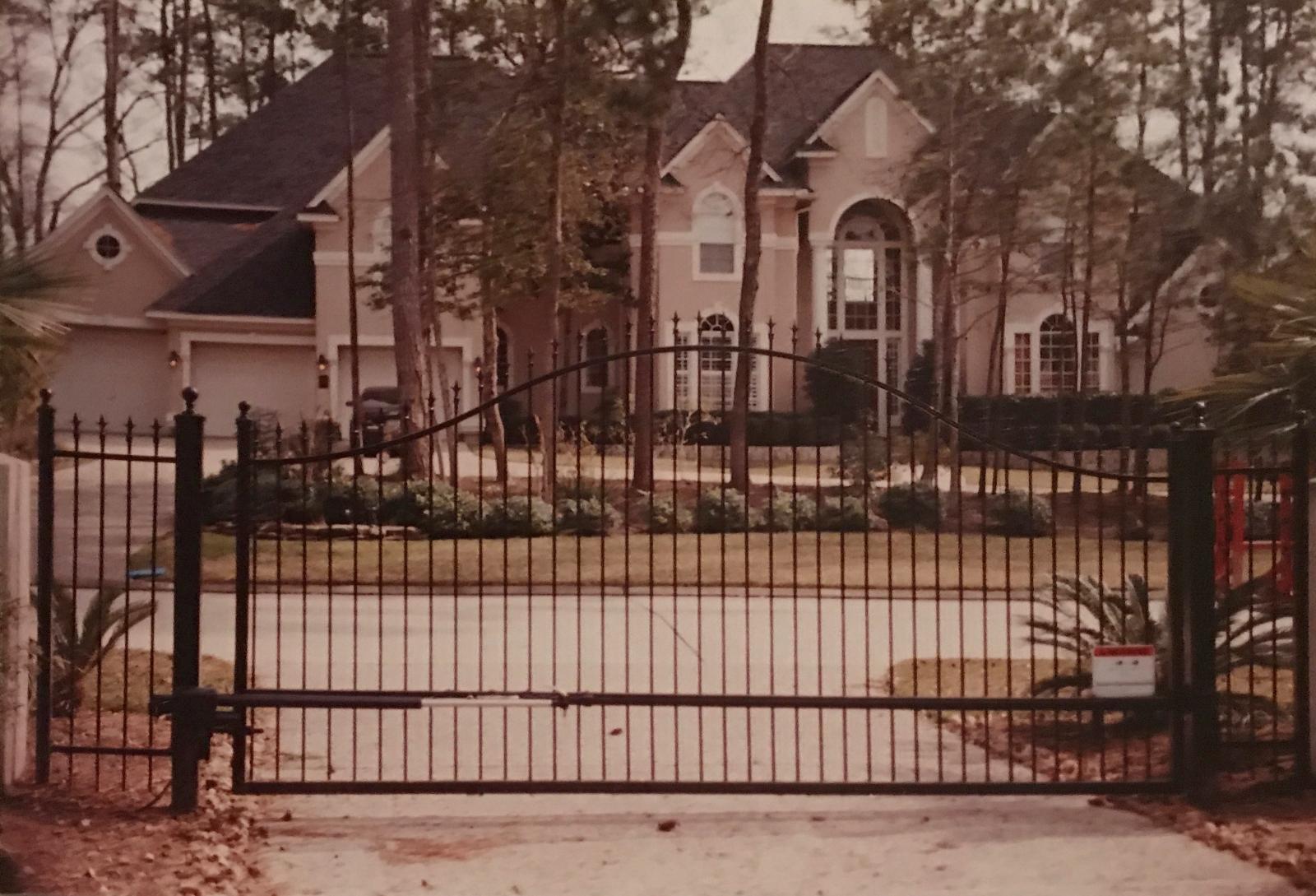 Arched Double Iron Gates with Swing Operator