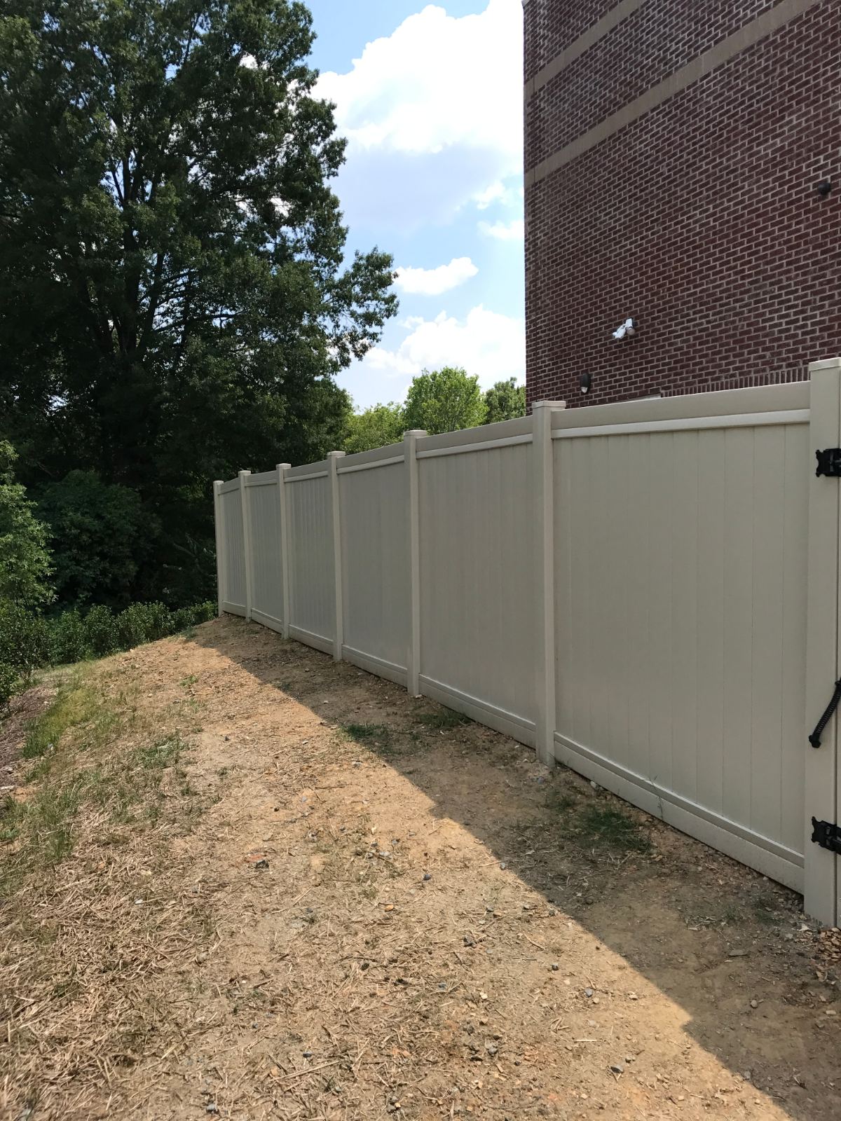 Exterior layout of 6-foot high tan vinyl privacy fence around nursery at Mission Baptist Church