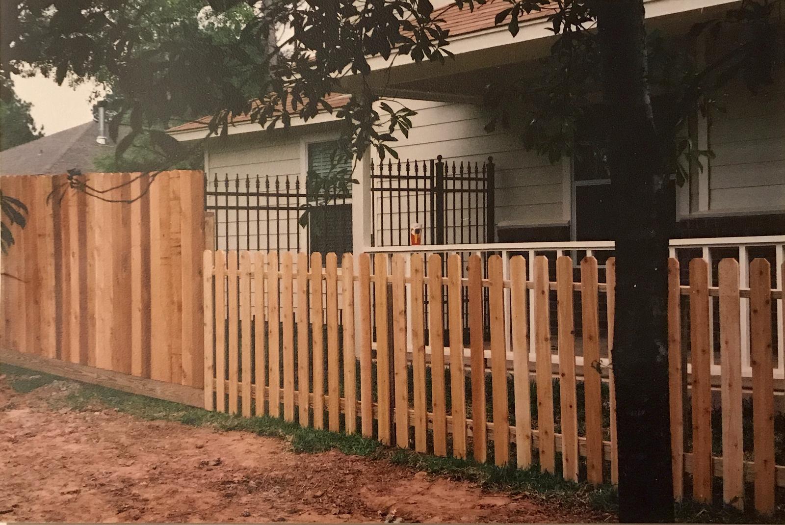 Spaced picket cedar fencing