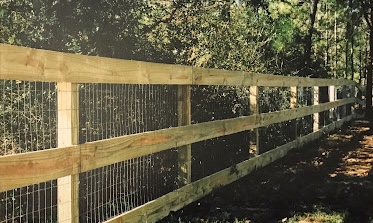 Wood and wire farm fence